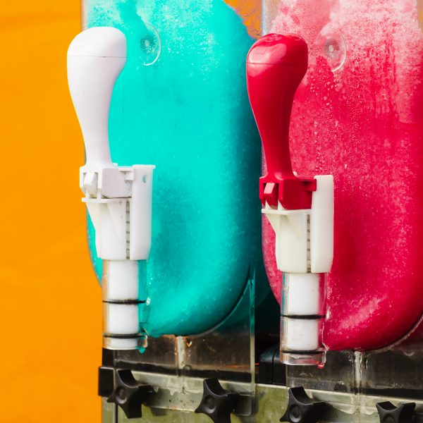 Close up of slush machine. Slushy ice made colorful drink refreshing during summer
